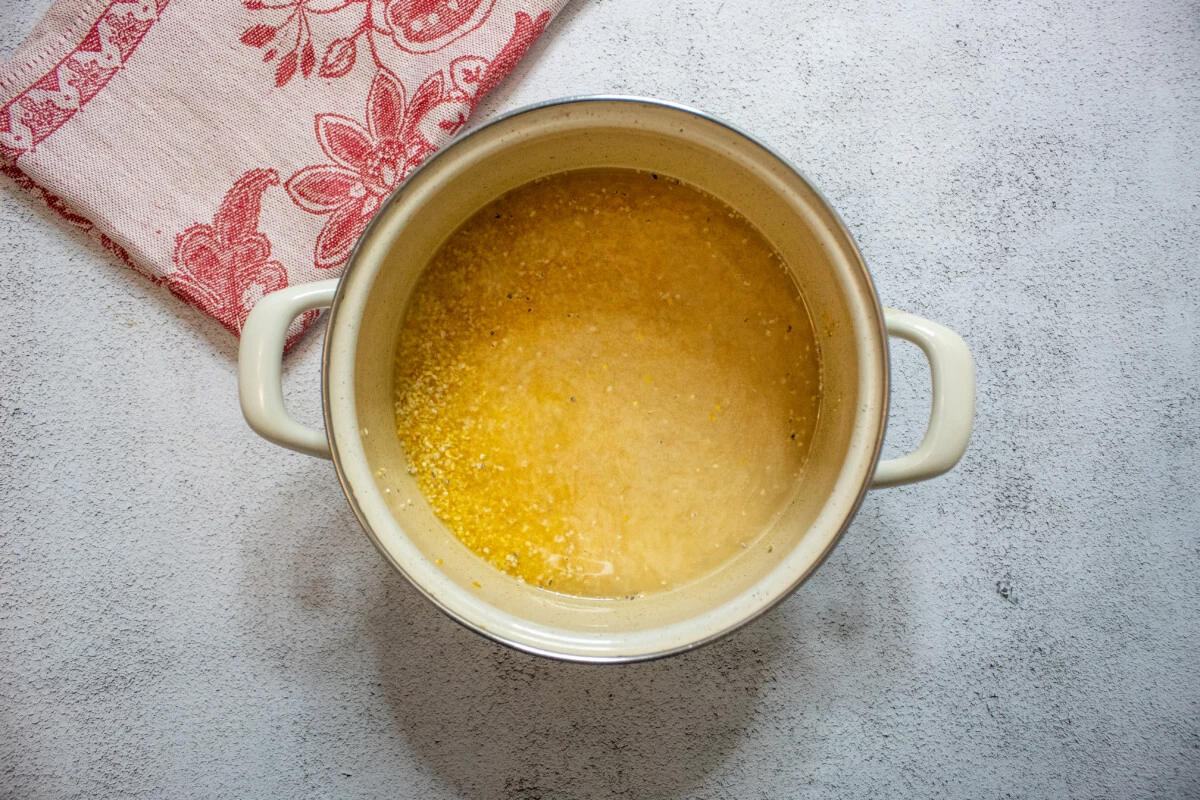 Фото приготовления рецепта: Каша пшенная на воде с маслом - шаг №2