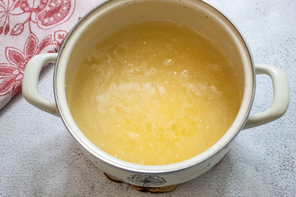 Фото приготовления рецепта: Каша пшенная на воде с маслом - шаг №5